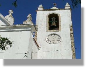 Algoz's main church with clock tower